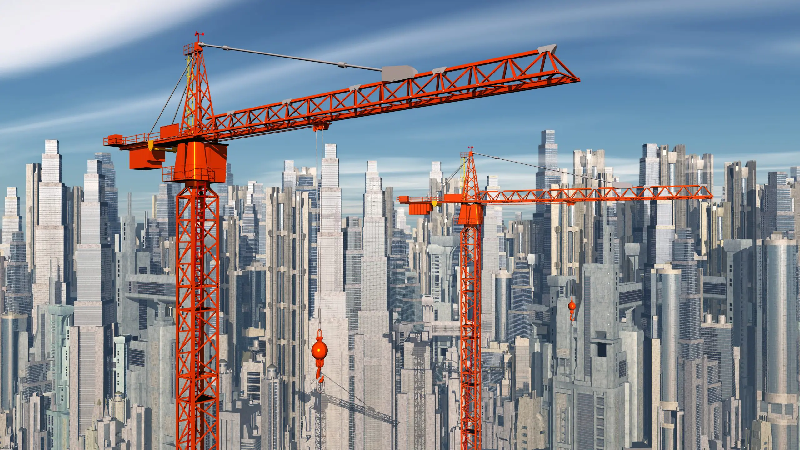 Baukräne vor einer Stadtlandschaft