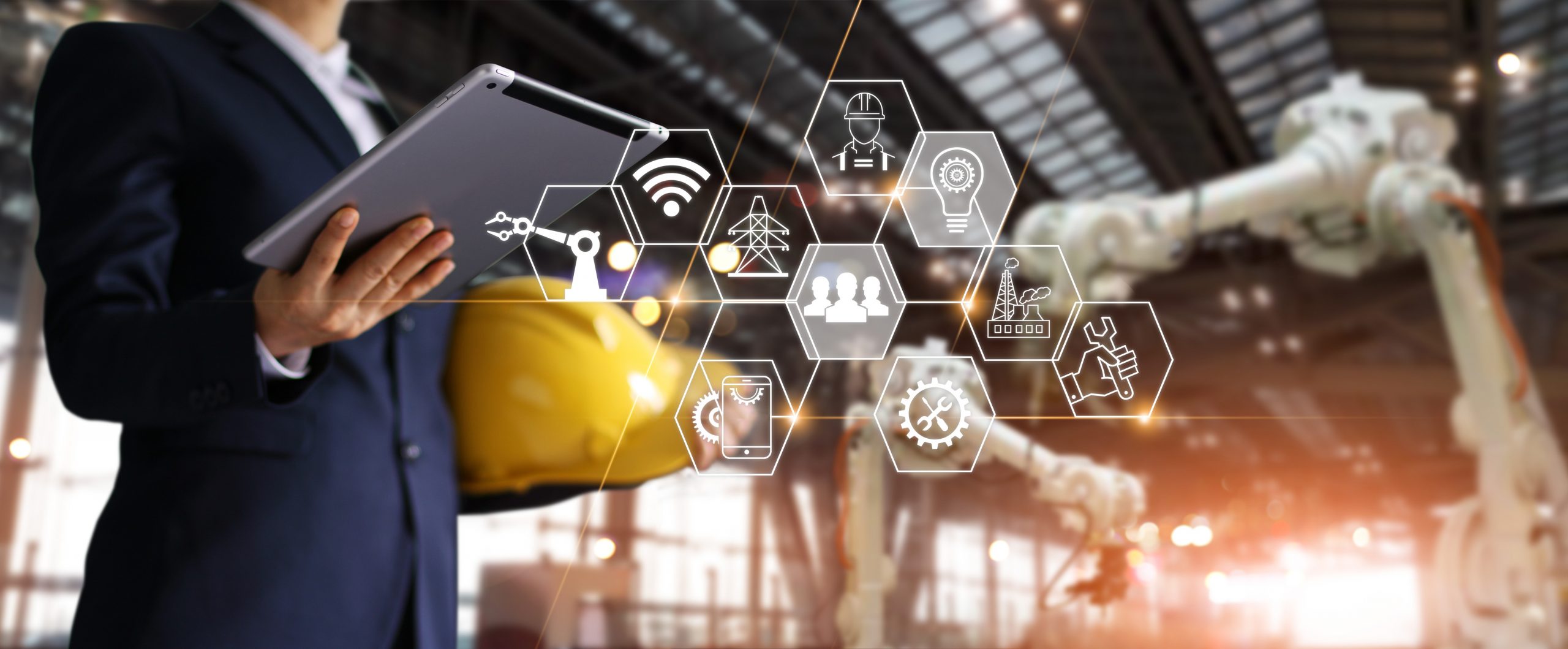 A futuristic architect, Businessman, Engineer manager using tablet with icon. Construction technology concept